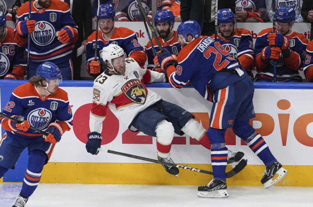 Florida Panthers players react after squandering a 3-goal lead against the Edmonton Oilers in Game 4 of the Stanley Cup Final