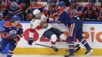 Florida Panthers players react after squandering a 3-goal lead against the Edmonton Oilers in Game 4 of the Stanley Cup Final