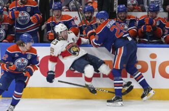 Florida Panthers players react after squandering a 3-goal lead against the Edmonton Oilers in Game 4 of the Stanley Cup Final